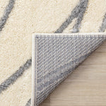 Sully 6'7" x 9'6" Circle Swirl Area Rug - Cream