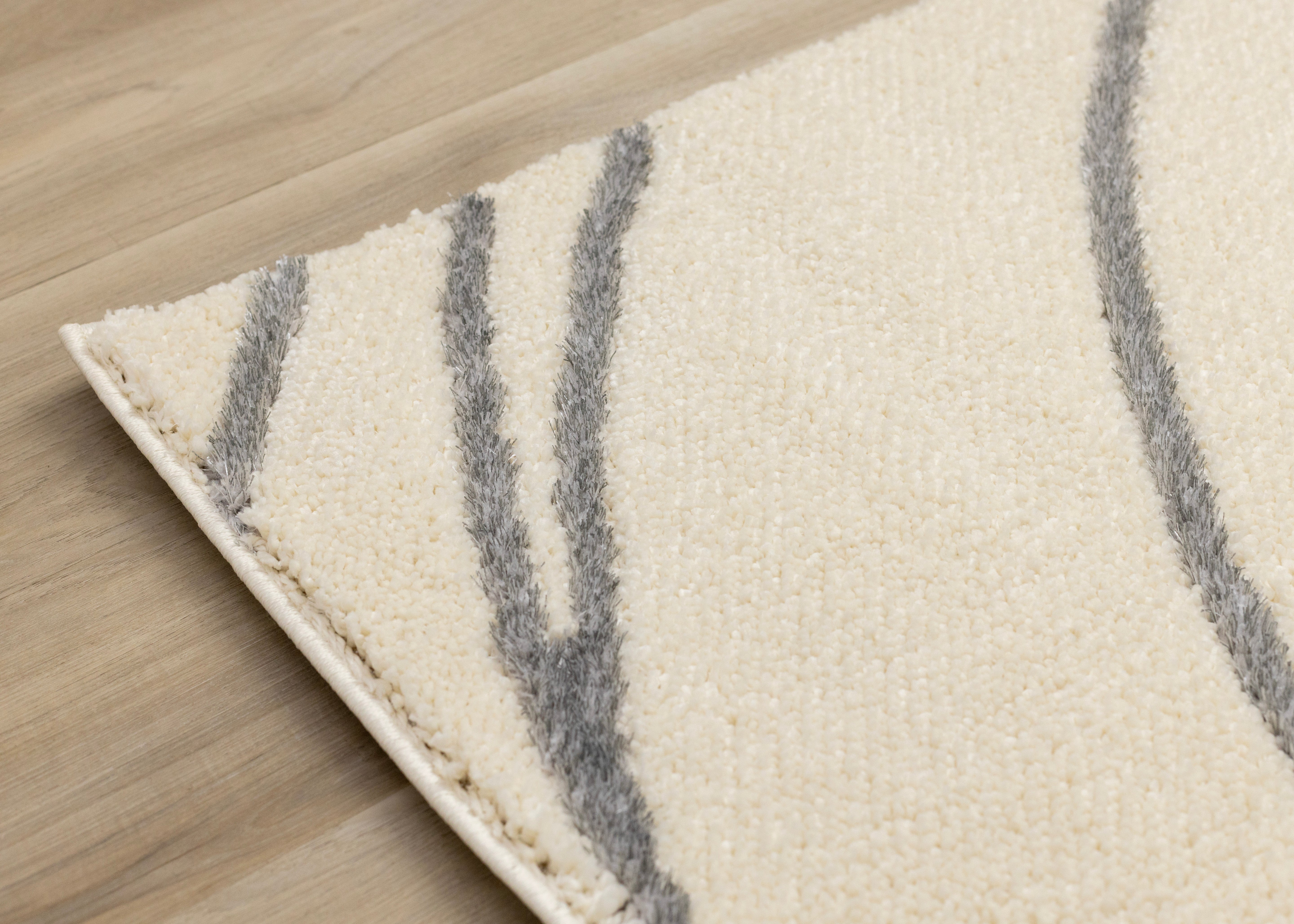 Sully 5'3" x 7'7" Circle Swirl Area Rug - Cream