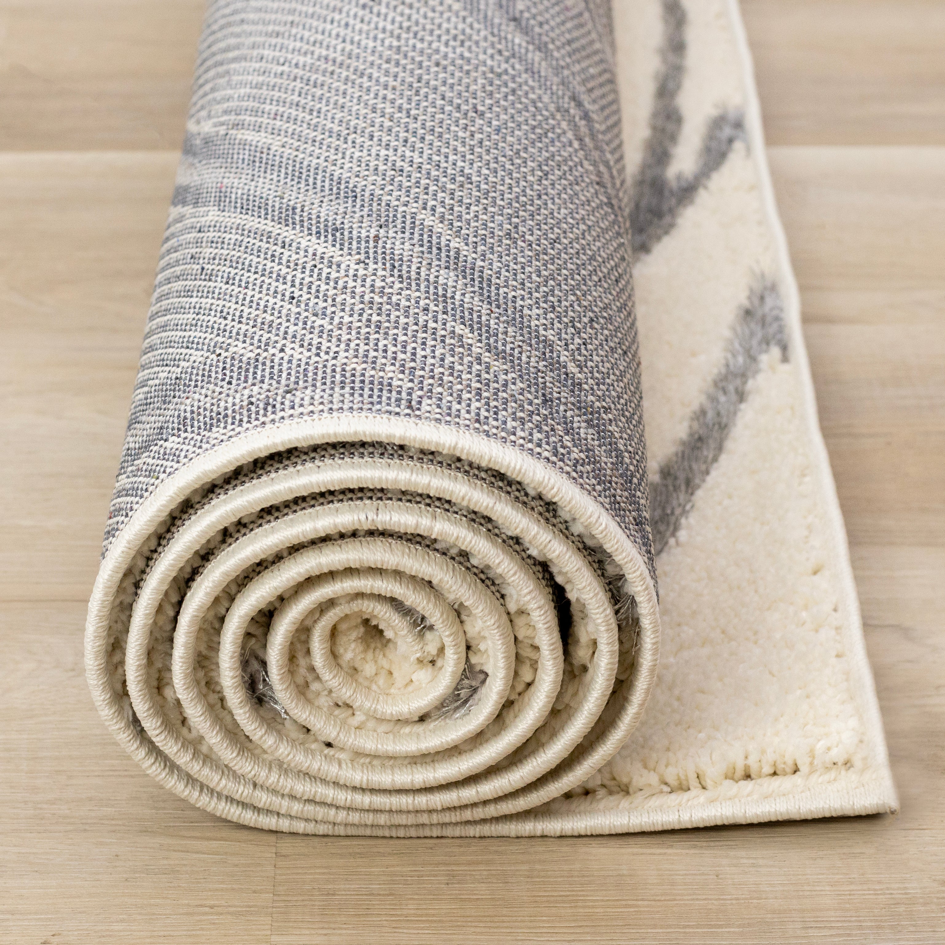 Sully 6'7" x 9'6" Circle Swirl Area Rug - Cream