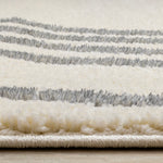 Sully 6'7" x 9'6" Circle Swirl Area Rug - Cream