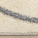 Sully 5'3" x 7'7" Circle Swirl Area Rug - Cream