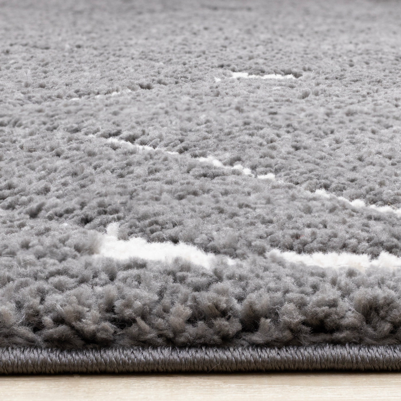 Obsidian 6'7" x 9'6" Broken Lattice Area Rug - Grey, White