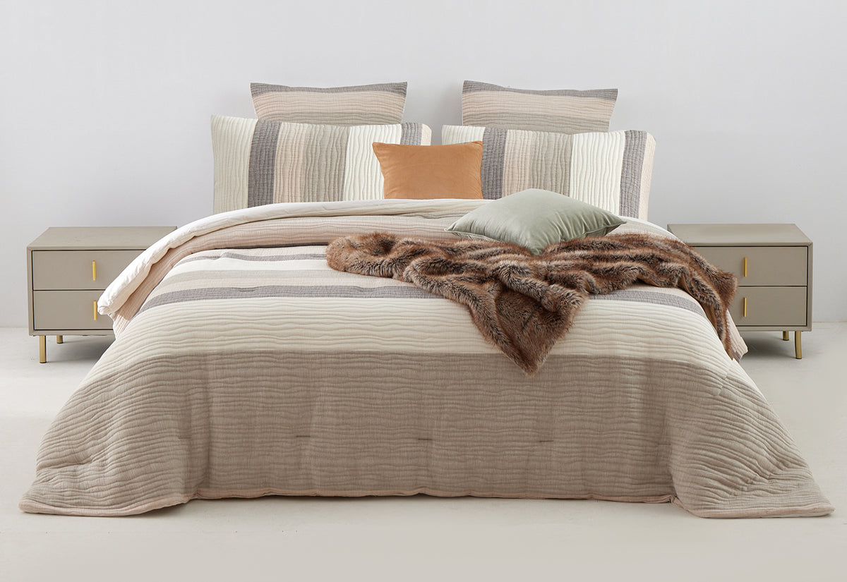 The Great Indoors 5-Piece Queen Comforter Set in cream, beige and grey stripes styled on a bed with coordinating pillows
