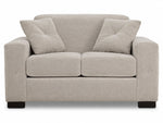 Valetta Loveseat - Ivory front view with two seat cushions, wide track arms, dark block feet and matching accent pillows