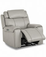 Velocity light grey home theatre recliner angled view with power footrest extended and padded headrest