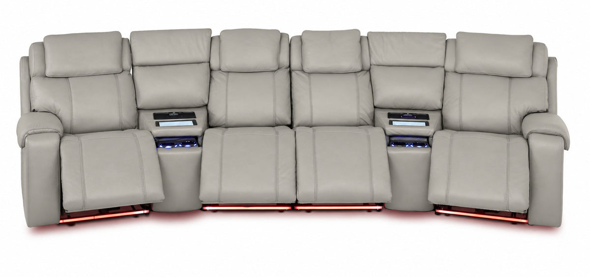 Velocity light grey home theatre seating front view with extended footrests, illuminated consoles and base lighting