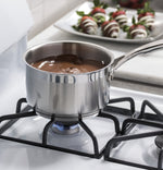 GE White Freestanding Gas Range (5.0 Cu. Ft.) - JCGBS60DEKWW