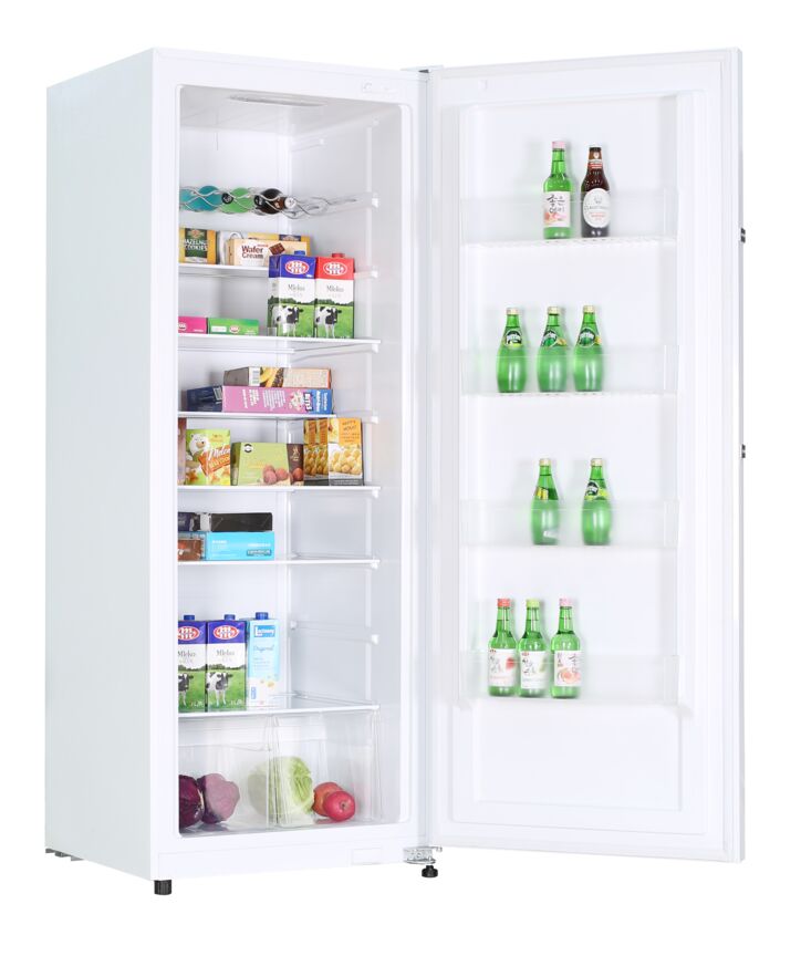 A white refrigerator with an open door displaying ample storage for groceries.